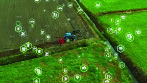 Agtech field with tractor and abstract geometrics graphics overlaid